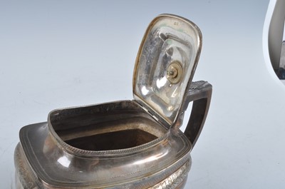 Lot 1071 - A George III silver teapot, of shaped...