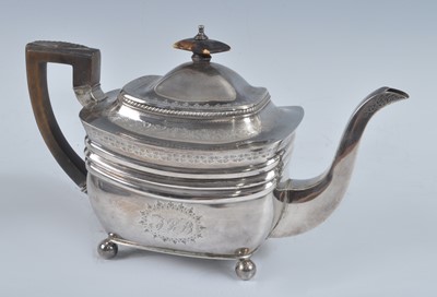 Lot 1066 - A George III silver teapot, of shaped...