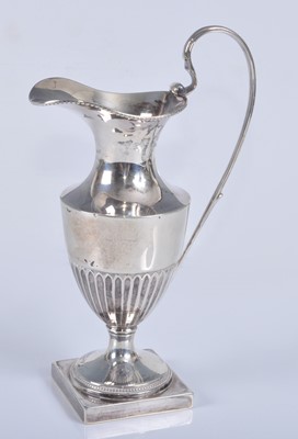 Lot 1097 - An Edwardian silver miniature ewer, of...