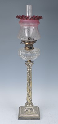 Lot 1254 - A Victorian silver plated oil lamp, having an...
