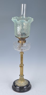 Lot 1257 - A Victorian brass oil lamp, having a vaseline...