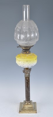 Lot 1258 - A Victorian brass oil lamp, having an acid...