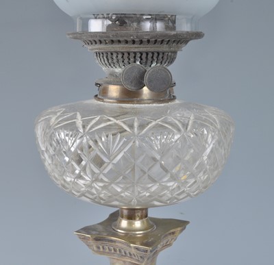 Lot 1259 - A Victorian silver plated oil lamp, having an...