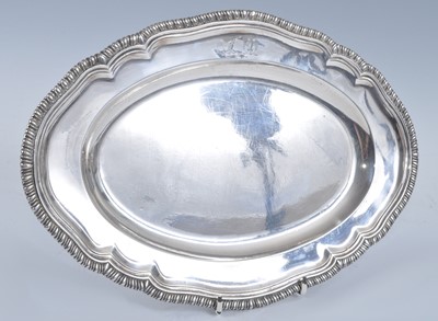 Lot 1061 - A George II heavy silver dish, of shaped oval...
