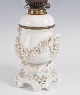 Lot 1261 - A 19th century blanc de chine porcelain oil...
