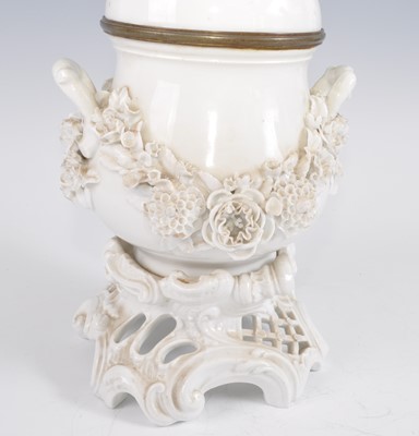 Lot 1261 - A 19th century blanc de chine porcelain oil...