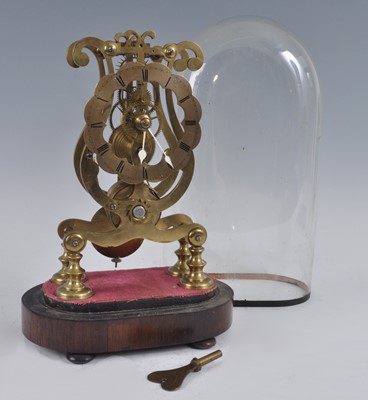 Lot 1374 - A 19th century brass skeleton clock, having...