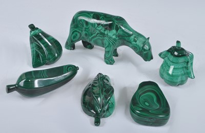 Lot 1265 - A collection of polished malachite carvings,...