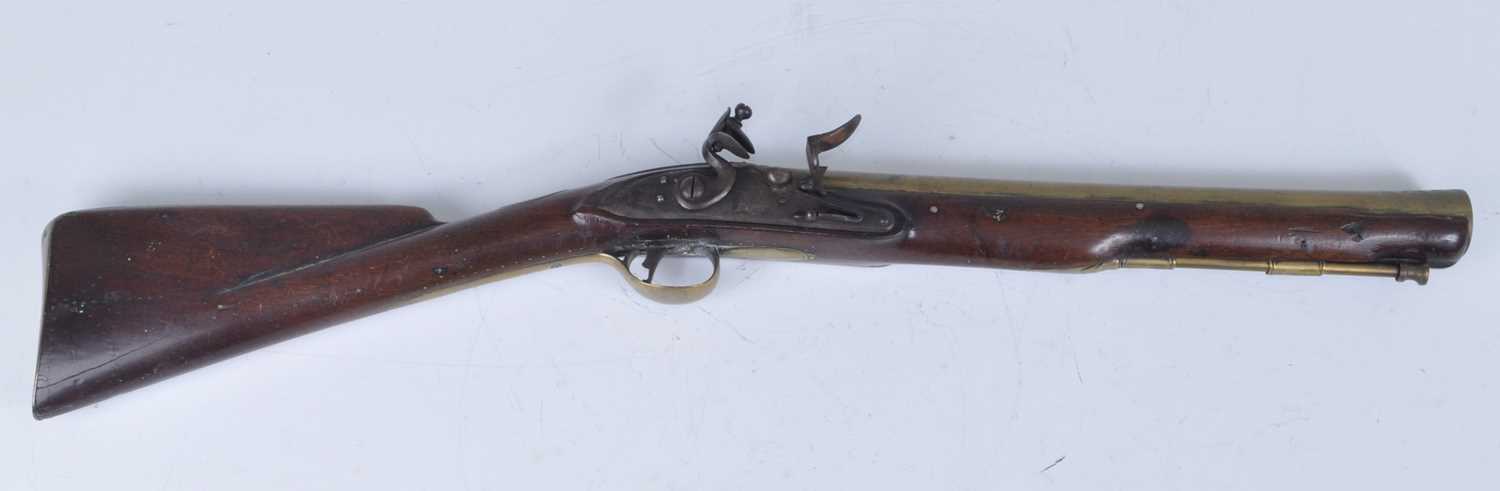 Lot 109 - A late 18th / early 19th century flintlock...