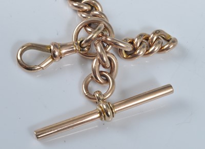 Lot 1221 - A 9ct gold curblink watch chain with T bar and...