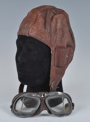 Lot 251 - A mid-20th century brown leather flying helmet,...