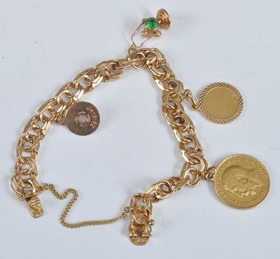 Lot 1127 - An 18ct gold flat double curblink bracelet...