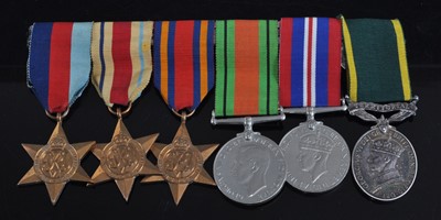 Lot 248 - A group of six medals, to include 1939-1945...