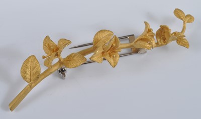Lot 1132 - A yellow metal bar brooch in the form of a...