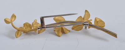Lot 1132 - A yellow metal bar brooch in the form of a...