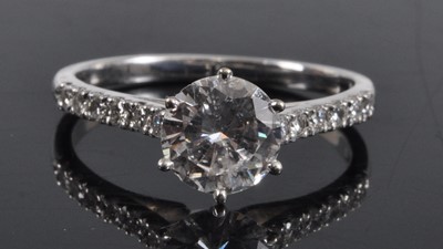 Lot 1151 - A white metal diamond solitaire ring,...