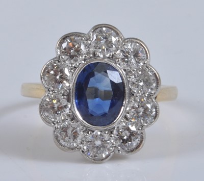 Lot 2194 - A yellow and white metal, sapphire and diamond...