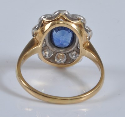 Lot 1152 - A yellow and white metal, sapphire and diamond...