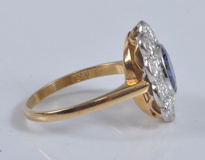 Lot 1152 - A yellow and white metal, sapphire and diamond...