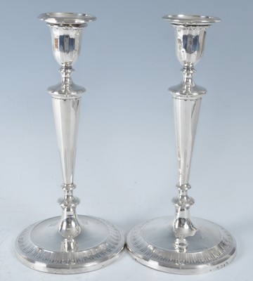 Lot 1065 - A pair of George III silver loaded...