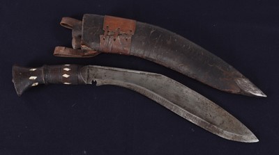 Lot 181 - A 20th century kukri, having a typical 30cm...