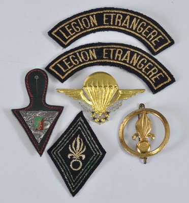 Lot 186 - A French Foreign Legion gilt brass beret badge...