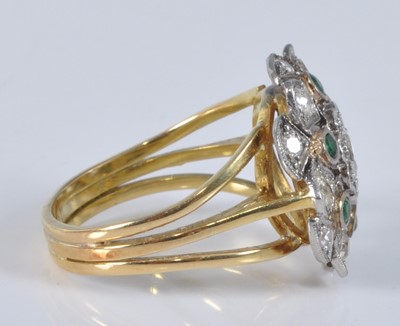Lot 1158 - A yellow and white metal, emerald and diamond...