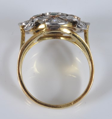 Lot 2193 - A yellow and white metal, emerald and diamond...