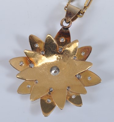 Lot 1163 - A yellow and white metal diamond flower...