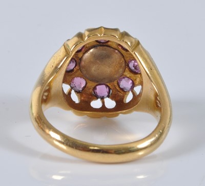 Lot 1147 - A yellow metal, pearl and ruby heavy circular...