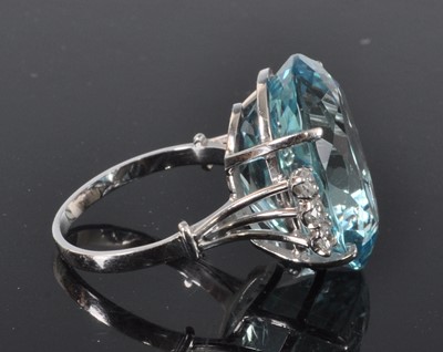 Lot 1164 - A white metal, aquamarine and diamond ring,...