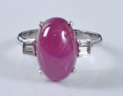 Lot 1157 - A white metal, ruby and diamond...
