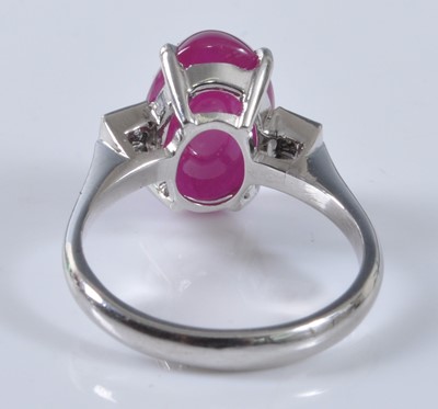 Lot 1157 - A white metal, ruby and diamond ring,...