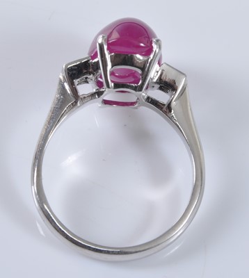 Lot 1157 - A white metal, ruby and diamond ring,...