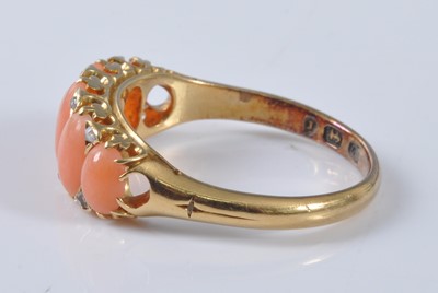 Lot 1173 - A yellow metal coral half hoop eternity ring,...