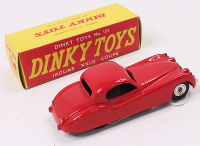 Lot 1002 - Dinky Toys No.157 Jaguar XK120 comprising red...