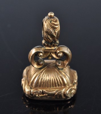 Lot 1138 - An early 19th century gilt metal fob seal,...
