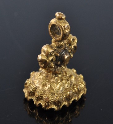 Lot 1138 - An early 19th century gilt metal fob seal,...