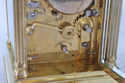 Lot 1373 - A circa 1900 lacquered brass carriage clock,...