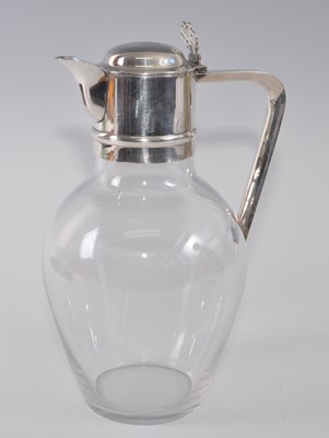 Lot 1088 - A Victorian silver topped and glass claret jug,...