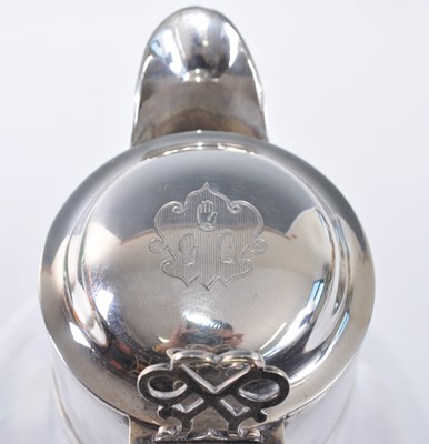 Lot 1088 - A Victorian silver topped and glass claret jug,...