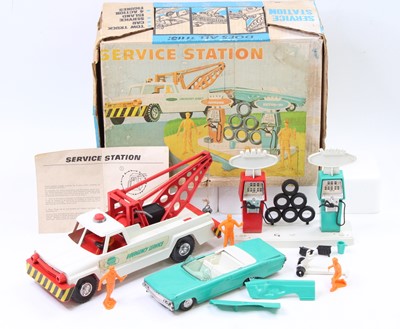 Lot 2039 - A Deluxe Topper Toys Ltd boxed service station...