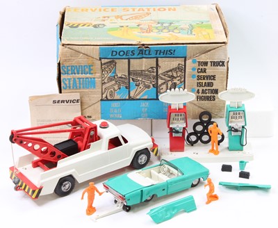 Lot 2039 - A Deluxe Topper Toys Ltd boxed service station...