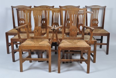 Lot 1400 - A set of eight George III joined oak dining...