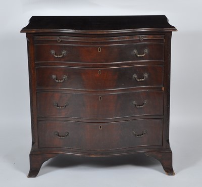 Lot 1405 - A mahogany serpentine front chest in the...
