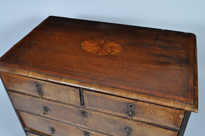 Lot 1410 - An early 18th century walnut and inlaid chest,...