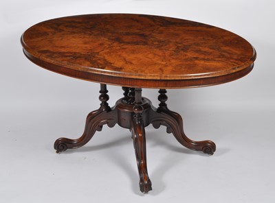 Lot 1417 - A Victorian figured walnut pedestal loo table,...