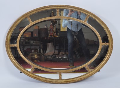 Lot 1422 - A late 19th century giltwood and gesso oval...
