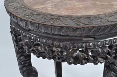 Lot 1284 - A Chinese 'rosewood' and marble topped...