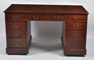 Lot 1435 - A Victorian walnut twin pedestal desk, having...